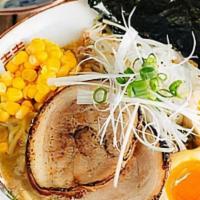 Miso Ramen · Ramen noodle with Chashu pork, seaweed, bok choy, bean sprout, corn, egg in Miso broth.