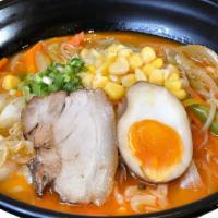 Spicy Miso Ramen · Ramen noodle with Chashu pork, Japanese Fish Cake, seaweed, bok choy, bean sprout, corn, egg...