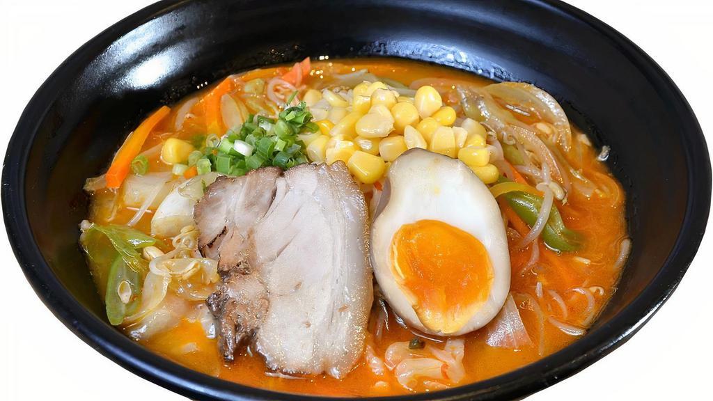 Spicy Miso Ramen · Ramen noodle with Chashu pork, Japanese Fish Cake, seaweed, bok choy, bean sprout, corn, egg in Miso broth.