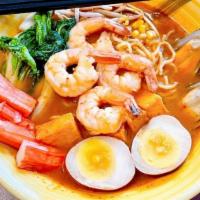 Spicy Seafood Ramen · Ramen noodles with Shrimp, Fish Tofu, Crabstick, seaweed, bok choy, bean sprout, corn, and e...