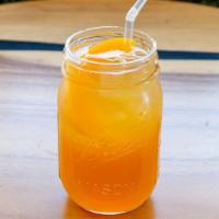 Peach Iced Tea · Our amazing Peach Iced Tea is made fresh with White Peach Peony tea leaves and infused with ...
