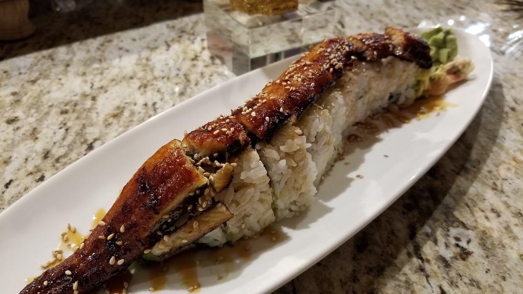Dragon · Shrimp Tempura/Crabmeat/Avocado
(Thick cut Eel on top)