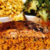 Blackened Salmon Platter · 1 Blackened salmon served on a bed of yellow rice a choice of 2 sides