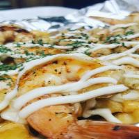 Seafood Fries · Shrimps and Crab meat served  over seasoned fries with chipotle aioli and American cheese sa...
