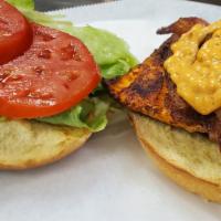 Blackened Salmon Blt · Blackened salmon steak  with bacon, lettuce, tomato and chipotle aioli sauce served on a toa...