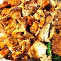 Jerk Chicken  Shrimp & Salmon · Chopped grilled chicken breast drizzled with house special jerk-BBQ sauce and a steak of bla...