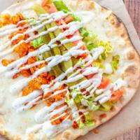 Ajeen Chicken · Flatbread with shredded chicken topped with Mozzarella cheese, served with lettuce, pickles ...