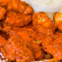 Buffalo Wings · Served with fries or onion rings.
