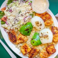 Chicken Kabob · Served with greek salad rice or french fries and a piece of syrian bread.