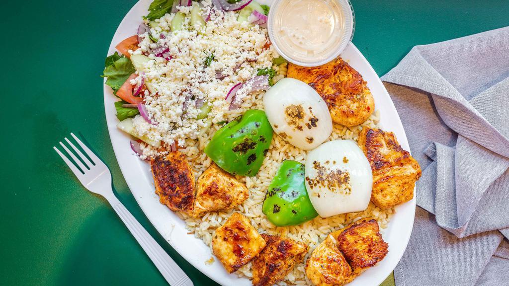 Chicken Kabob · Served with greek salad rice or french fries and a piece of syrian bread.