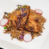 Roasted Chicken And Farro · Exotic Mushrooms, Onions, Green Peas, and Natural Jus.
