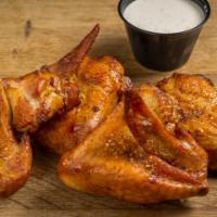 Smoked Wings (8) · Smoked jumbo wings finished on our wood burning grill. Your choice of Buffalo, Voodoo Sauce ...
