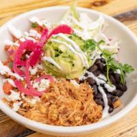 Pollo Tinga Bowl (Chicken) · Tinga style chicken over red rice with pico de gallo, black beans, pickled red onion, cabbag...