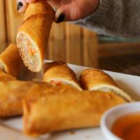 Crispy Roll · Recommended. Crystal noodles with ground pork, cabbage and carrots, wrapped and fried, serve...