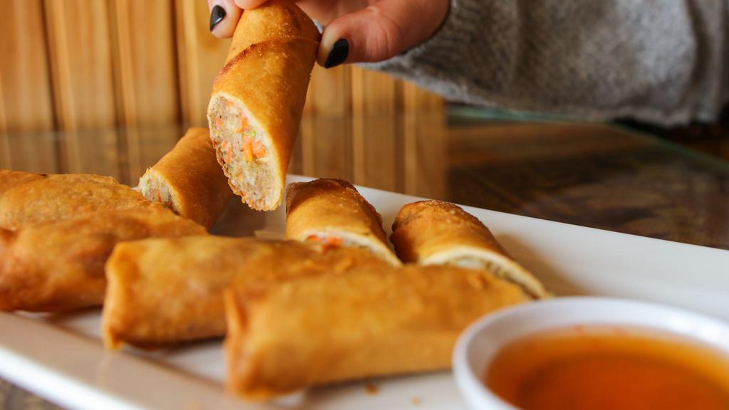 Crispy Roll · Recommended. Crystal noodles with ground pork, cabbage and carrots, wrapped and fried, served with sweet and sour sauce