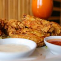 Thai Crispy Wings · New. Deep fried crispy chicken wings, served with Thai sweet chilli sauce