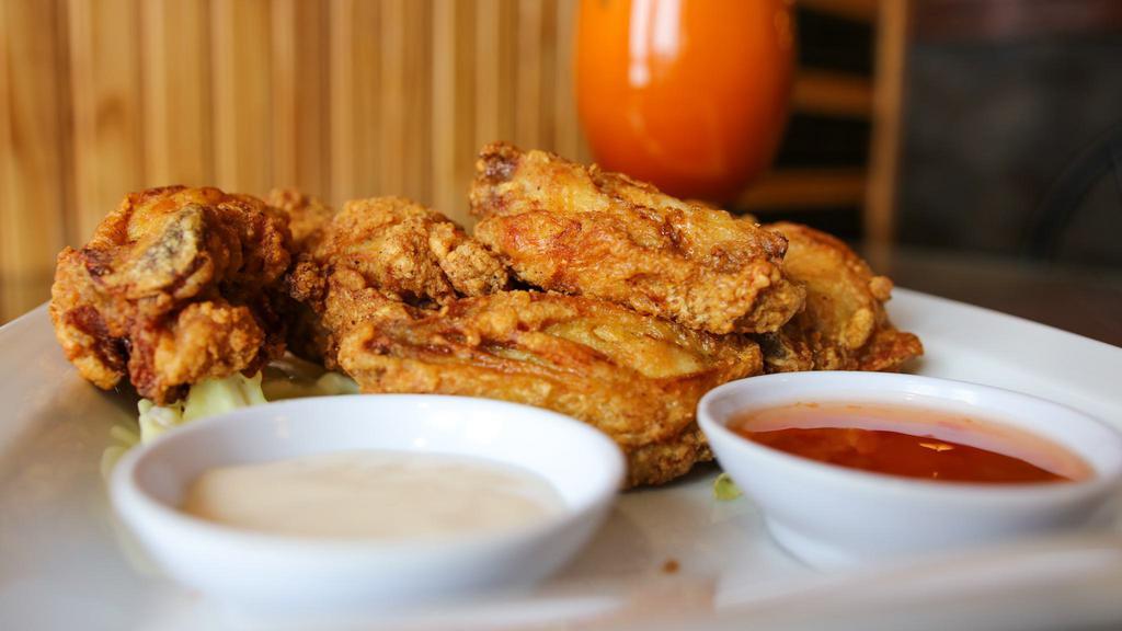 Thai Crispy Wings · New. Deep fried crispy chicken wings, served with Thai sweet chilli sauce