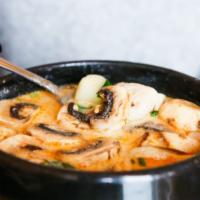 Tom Khar Kai (Coconut Soup) · Gluten free. Savory and mild chicken soup with coconut cream, mushrooms, galanga, cilantro a...