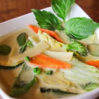 Green Curry · Mild green curry with coconut milk, eggplant, bamboo shoots, mushrooms, green peppers and ba...