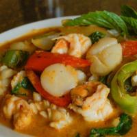Siam Gulf Talay · Gluten free. Pan stir fried shrimp, squid and scallops in spicy red curry sauce with bell pe...