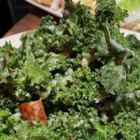 Kale Caesar Salad · Chopped kale, parmesan, crouton, house made Caesar dressing, and anchovies.