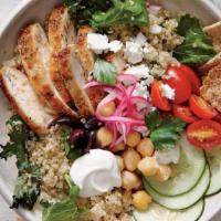 Chicken Gyro Bowl · Fresh grilled chicken on a bed of fluffy rice, crispy chickpeas and a garden side salad. Top...