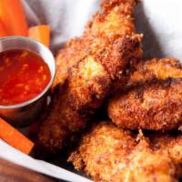 Chicken Tenders With Hot Sauce · Deep fried breaded tenders with a hot sauce.