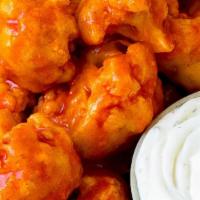 Buffalo Cauliflower · Crispy cauliflower, mild buffalo sauce.