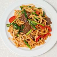 Dry Fried Noodle · Dry fried hand pulled noodles with veggies and beef.