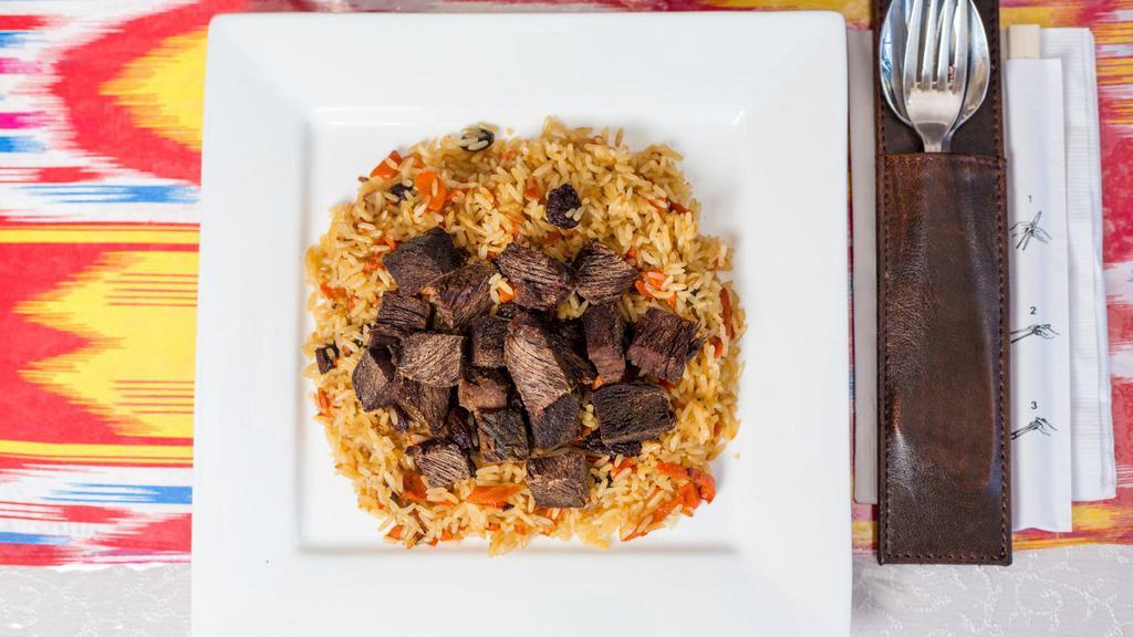 Uyghur Pilaf · Traditional uyghur braised rice cooked with carrot, onion, and beef.