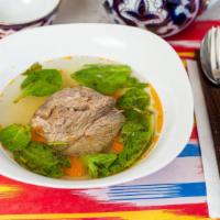 Lamb Soup · Uyghur style lamb soup with lamb, carrot, leek, and cilantro.