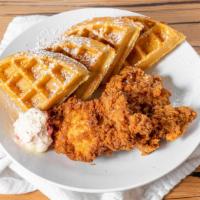 Fried Chicken And Waffles · 10 oz tender boneless skinless chicken breast on a large waffle served with strawberry butte...