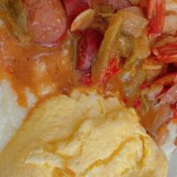 Shrimp And Grits · Classic etouffee sauce and sunny side up eggs
