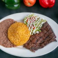Carne Asada · Grilled marinated steak. Served with rice & beans, pico de gallo, sour cream & 2 tortillas.