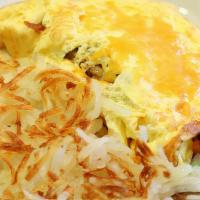 Western Omelet · Ham, onions, bell pepper and cheddar cheese.