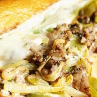 Philly Cheesesteak · Sliced sirloin steak with Swiss cheese, onions and green peppers.