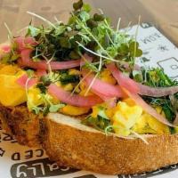 Egg Salad Toast · Local eggs from Like A Mustard Seed Farm, avocado mayo, fresh herbs topped w/picked red onio...