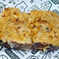 French Onion Toast · Caramelized Onions, Gruyere, Thyme on Toasted Nord Bread