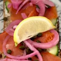 Lox Toast · Toasted Nord Bread, Cream Cheese, Cucumber, Wild Caught Lox, Capers, Pickled Red Onion, Toga...