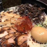 Akamaru Modem Ramen · Hot & spicy. 3 Pc  charsiu, wood fungus, bamboo, whole egg, special soup, special sauce, sca...