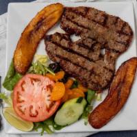 Carne Asada / Grilled Steak · Servida con frijoles, arroz, ensalada y maduros / With beans, rice, salad and fried sweet pl...