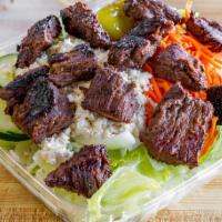 Steak Tip Kabab Salad · Served with homemade Syrian bread and dressing on the side.