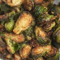 Szechuan Brussels Sprouts (V) · Crispy brussels sprouts, housemade Szechuan chili oil.