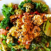 Bada Bang Shrimp Salad · romaine, kale, pickled vegetables, togarashi peanuts, carrot ginger vinaigrette.