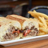 Vegan Cheesesteak   · Plant-based meat, cherry peppers, cooper sharp, 
caramelized onion remoulade, rustic roll