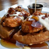 Chicken & Waffles · buttermilk fried chicken, country gravy, waffles, maple syrup, candied bacon crumbles.