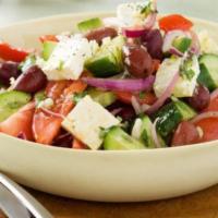 Greek Salad · Grilled chicken lettuce tomato olives feta cheese and greek dressing.