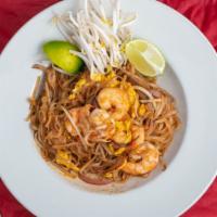 Shrimp Pad Thai · Shrimp and Thai noodles with ground peanuts, onion, bean sprouts and egg in a light Thai sau...
