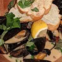 Mussels · In Red or White with garlic bread!