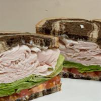 Oven Roasted Turkey Sandwich · with your choice of bread & toppings